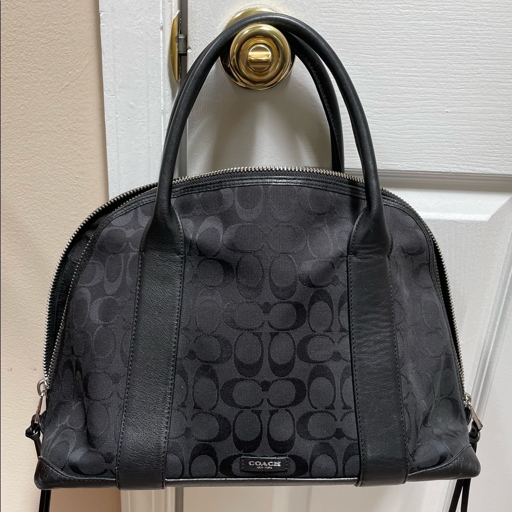 Large signature COACH bag.